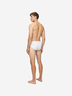 Our mid-height brief has a closed front for a clean and classic look. We chose a super-soft binding to finish the hems; all part of our quest for a minimalist streamlined look and the ultimate in softness and comfort. Our Alex quality combines a blend of 94% micro modal and 6% elastane for exceptional softness and comfort. Not only is the Alex soft, but thermostatic properties in the micro modal fibres allow them to react to changes in temperature and regulate your body heat. What's more, the fa Classic White Brief Bottoms, Classic Stretch Bottoms With Moderate Coverage, White Bottoms With Soft Touch, White Soft Touch Bottoms For Daywear, White Brief Bottoms With Moderate Coverage, Classic Seamless No-show Bottoms, Solid Bottoms With Moderate Back Coverage And Minimal Stretch, Solid Color Bottoms With Moderate Back Coverage, Classic Soft Touch Bottoms