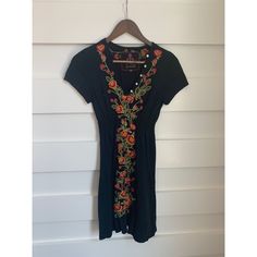 New, Without Tags. Black Short Sleeve Floral Embroidered Midi Dress. V-Neck With Button Detail Around The Neckline. Fitted V-neck Dress With Embroidered Neckline, Black V-neck Dress With Floral Embroidery, Fitted Embroidered Dress With V-neck, Casual Multicolor Embroidered V-neck Dress, Casual Multicolor Embroidered Fitted Dress, Casual Fitted Embroidered Dress With Multicolor Embroidery, Casual Fitted Dress With Multicolor Embroidery, Black Embroidered Neckline Fitted Dress, Fitted Black Dress With Embroidered Neckline