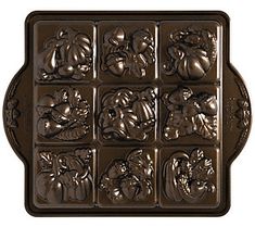 a chocolate mold that looks like it has many different fruits and vegetables on it