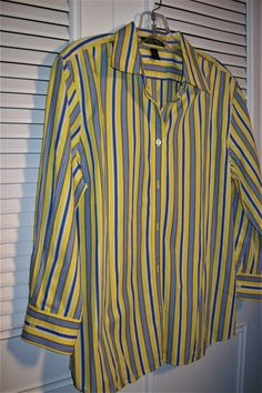 "Wonderful cotton long sleeved cotton shirt by Ralph Lauren. Never worn. Yellow and royal blue stripe. Bust measures 42\", length 26\". No flaws of any kind. Stored with TLC. Comes from a smoke-free home." Blue Long Sleeve Blouse With Vertical Stripes, Long Sleeve Cotton Tops With Vertical Stripes, Cotton Long Sleeve Top With Vertical Stripes, Cotton Long Sleeve Blouse With Vertical Stripes, Classic Long Sleeve Tops With Vertical Stripes, Fitted Long Sleeve Shirt With Vertical Stripes, Classic Long Sleeve Blouse With Vertical Stripes, Classic Yellow Long Sleeve Blouse, Classic Long Sleeve Yellow Blouse