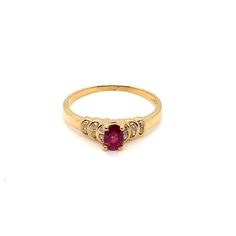 Vintage 18K Yellow Gold genuine Ruby and Diamond Ring - The oval ruby measures 5.4 x 3.6mm and weighs about .50ct. It has a beautiful deep red color and sits 4.2mm high off the finger. There are 12 round diamonds set in a crescent moon design that weigh about .18ct with G - H color and I1 clarity. The ring is stamped 750 (18k).  Weight: 2.23 g  Size: 7 1/4 US Can be sized upon request. Oval Ruby Diamond Ring, Oval Ruby Ring With Center Stone, Classic Oval Red Birthstone Ring, Classic Red Oval Birthstone Ring, Elegant Ruby Ring With Oval Center Stone, Oval Ruby Rings In Yellow Gold, Oval Yellow Gold Ruby Ring With Center Stone, Red Oval Hallmarked Birthstone Ring, Oval Ruby Birthstone Ring With Accent Stones