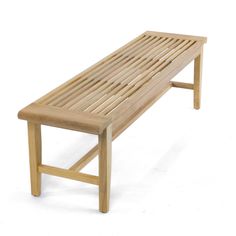 a wooden bench sitting on top of a white floor