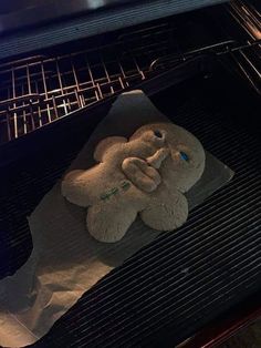 an elephant shaped cookie is baking in the oven