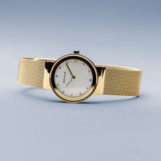 Classic, puristic, and yet exciting. Perfect style combined with contemporary minimalism. Inspired by Danish design, the CLASSIC COLLECTION represents a unique timepiece, perfectly highlighting your daily style.  The polished gold colored stainless steel case, made of pure, high quality, medical-grade stainless steel (316L), in combination with the modern gold colored milanese strap, provides the classic BERING look. The fine workmanship of the milanese strap gives the watch a refined, almost no Thomas Sabo Bracelet, Silver Water, Watches Unique, Classic Watches, Daily Style, Gold Case, Blue Topaz Ring, Classic Collection, Danish Design