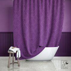 a bath tub sitting next to a purple wall with a shower curtain in the middle