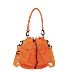 Multi-Pocket Drawstring Bucket Bag Width Height Thickness Handle Length 24 24 14 26 measurement is cm.Product Information Material: 100% Nylon Color: Black Wash care: Hand Wash, Wipe Clean Multi Pocket Bag, Utility Bag, Drawstring Bucket Bag, Orange Bag, Hand Bags, Trendy Fashion Women, Haiti, Honduras, Ghana