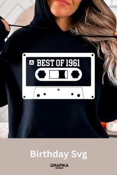 a woman wearing a black hoodie with the words best of 1971 printed on it