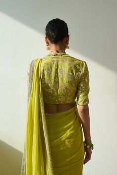 Introducing the mesmerizing soraya sari and blouse set, fashioned from luxurious georgette fabric in a captivating lime green hue. This ensemble comprises two stunning components, meticulously adorned with intricate embroidery including trims, cutwork, and delicate handwork. Elevate your allure with this ethereal ensemble, designed to captivate attention at any special occasion. Green Georgette Choli With Cutdana, Pista Green Georgette Blouse For Wedding, Pista Green Blouse With Resham Embroidery For Reception, Green Chanderi Saree For Reception, Pista Green Georgette Blouse With Traditional Drape, Designer Pista Green Georgette Blouse, Green Georgette Blouse For Reception, Pista Green Chanderi Blouse Piece For Reception, Green Georgette Blouse Piece For Reception