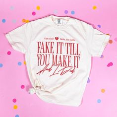 Channel all your feels with the Taylor Swift TTPD Fake it Til You Make It Tee. This shirt perfectly captures that vibe when you realize you can do it, WITH a broken heart! It's comfy, stylish, and the cozy wear for those who know that sometimes, the best therapy is finishing that to-do list. Get ready to sweat it out a Girl Tribe, Cozy Wear, Candle Cards, Sweat It Out, Kids Bath, When You Realize, Corporate Gifts, To Do, Custom Clothes