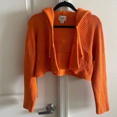 Size M Cropped Orange Cardigan Never Worn Cozy Cropped Outerwear For Spring, Spring Layering Orange Sweater, Cozy Orange Outerwear For Spring, Casual Cropped Cotton Cardigan, Winter Cropped Cotton Cardigan, Casual Orange Cotton Cardigan, Fall Cropped Sweater For Day Out, Spring Orange Knit Outerwear, Orange Knit Outerwear For Spring