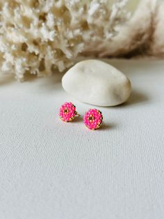 Make your everyday outfit more shiny wearing these pink/ gold beaded post earrings. These statement stud earrings are made from Miyuki Delica seed beads and supplied with stainless steel accessories. So lightweight and comfortable to wear, these dainty beaded studs would be the perfect adornment for holiday look. If you're looking for delicate seed bead earrings for special occassion, this pair is a great finding for you. Also, these minimalist earrings are making a great Christmas gift for bohe Pink Earrings With Colorful Beads For Festive Occasions, Pink Round Earrings With Tiny Beads, Pink Earrings With Tiny Beads, Pink Party Earrings With Tiny Beads, Pink Festive Earrings With Colorful Beads, Pink Colorful Beaded Earrings For Festive Occasions, Pink Beaded Earrings With Gold Beads As Gift, Pink Earrings With Gold Beads, Festive Pink Beaded Earrings For Pierced Ears