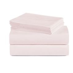 the sheets are folded and ready to be used in this bedding set, which is light pink