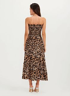 Looking for the perfect beach-to-street outfit? Look no further than our Jaguar Animal Print Dress, the ultimate in versatile style to match with your Brazilian Bikini Featuring a striking animal print design, our dress is perfect for any occasion, from a day at the beach to a night out on the town. The removable sleeves and elastic ruching add a touch of effortless chic to the design, while the lurex threads throughout the fabric add a touch of shimmer and shine. Crafted from high-quality mater Leopard Print Vacation Dresses, Leopard Print Summer Vacation Dresses, Summer Vacation Leopard Print Dresses, Chic Leopard Print Beach Dress, Sleeveless Leopard Print Beach Dresses, Leopard Print Maxi Dress For Beach, Summer Leopard Print Ruched Dress, Summer Ruched Leopard Print Dress, Spring Leopard Print Maxi Dress For Beach