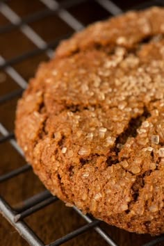 an oatmeal cookie cooling on a wire rack