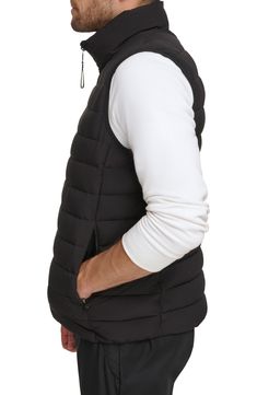 Whether you're deep in the backcountry or just your own backyard, you'll appreciate the cozy core warmth of this vest coated in a water-resistant finish. Front zip closure Stand collar Hidden side-zip pockets Water resistant Lined 100% polyester Machine wash, line dry Imported Cozy Core, Vest Coat, Nordstrom Store, Puffer Vest, Stand Collar, Side Zip, Nordstrom Rack, Zip Pockets, Calvin Klein