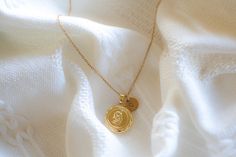 This locket necklace features a charming flower design and a flat circular shape. It serves as a keepsake for your most treasured memories, allowing you to insert a photo within it. Talk about a perfect gift idea! * How To Order 1. Choose the size. 2. Select initials, if you do not want any initial, select "NONE" (UPPER CASE and HEART Shape Available) if you want LOWERCASE please message me BEFORE placing the order!) 3. Add to cart and submit order :) * Locket : Photo Frame Pendant, Flat Round w Initial Pendant Necklace With Vintage Charm As Gift, Vintage Charm Initial Pendant Necklace Gift, Vintage Initial Pendant Necklace For Gifts, Elegant Medallion Necklace With Initial Pendant As A Gift, Elegant Vintage Charm Coin Necklace For Gift, Elegant Vintage Charm Coin Necklace As Gift, Elegant Vintage Charm Coin Necklace Gift, Elegant Vintage Coin Necklace As Gift, Vintage Charm Medallion Necklace For Gift