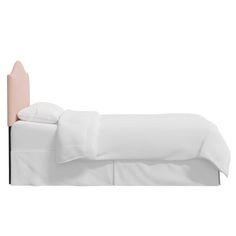 a white bed with a pink headboard and pillows on it's side, against a white background