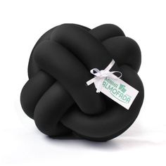 the black knot pillow has a tag on it