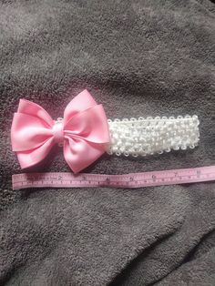 2 baby head bands  1 pink 1 agua blue 4 inch bow,  with 1.5 ribbon Adjustable Pink Bow Headband, Adjustable Pink Headband With Bow, White Bow With Matching Headband, White Headband With Bow Tie, White Bow Tie Headband, Adjustable Pink Bow For Party, Cute White Headband With Pink Bow, Adjustable White Bow Tie Headband, Pink Hair Accessories With Matching Headband