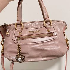 A Light Pink Miu Miu Handbag, Authentic, Adorned With A Heart-Shaped Crystal Pendant As Decoration, Super Cute Muimui Bag, Miu Miu Clothes, Chrome Hearts Bag, Cheengu Pink, Jane Birkin Bag, Pink Miu Miu, Fun Purses, Trinket Bag, Betty Boop Handbags