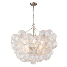 a chandelier with glass balls hanging from it's center point, on a white background