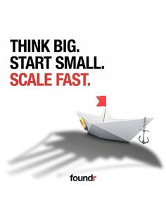 a white paper boat floating on top of a body of water with the words think big, start small scale fast