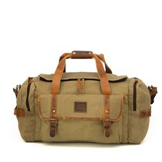 The Waxed Canvas and Leather Duffle Bag Haven’t found your ideal travel companion yet? Check out our waxed canvas and leather duffle bag. The Wasatch is named after the majestic mountain range in Utah and truly lives up to its namesake. Made from high-quality, durable full-grain cowhide leather with a heavy duty 18 oz. Wax canvas, this canvas and leather weekender bag with 55-liter and 25 liter variants is designed with both style and function in mind. Its brass feet hardware, heavy-duty side handles, and YKK zippers ensure it can withstand the rigors of travel.this waxed canvas duffle bag also features multiple pockets on the side, front, and inside, as well as a removable and adjustable strap with shoulder pads for comfort while carrying. The Wasatch is a comprehensive travel solution. A Waxed Canvas Duffle Bag, Wax Canvas, Leather Work Bag, Canvas Duffle Bag, Leather Duffel Bag, Leather Weekender Bag, Leather Duffel, Leather Weekender, Real Leather Bags