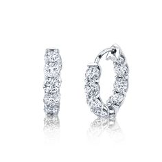 A jewelry box essential, these rounded diamond huggies are crafted in 18k white gold with that create the perfect amount of sparkle for day or night. Approximate Color HI, Clarity VS S Gold Huggie Earrings, Huggie Earring, Diamond Huggies, Hoop Earring Sets, Diamond Hoop Earrings, Huggies Earrings, White Diamond, Round Brilliant, Diamond White