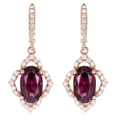 Celebrating Magenta as the color of the year for 2023, we present our exclusive Radiating Rhodolite collection. The magnificent magenta hues in these gems are brought to life in a classic rose gold setting with white diamonds. Rhodolite Drop Earring in 18 Karat Rose Gold with White Diamond. Rhodolite: 4.95 carat, 10X6mm size, Oval shape. White Diamond: 0.537 carat, 1.30mm size, round shape, G color, VS clarity. Gold: 5.172g, 18Karat Rose Gold. Lever Back. E474 Shiny Rings, Embroidery On Kurtis, Kurti Embroidery Design, Naha, Drop Earring, Dream Jewelry, Color Of The Year, Gold Set, White Rose Gold