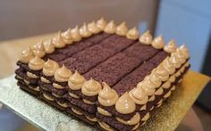 a chocolate cake with peanut butter frosting on top