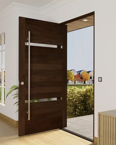 an open wooden door in a white room