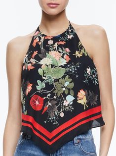 Embrace retro vibes with the Frenchie Handkerchief Halter Top from Alice + Olivia. This unique top features a halter neck, sleeveless design, and an open back with a playful tie closure. The exclusive-to-us print adds a touch of fun to any outfit. Perfectly paired with high-rise denim for a chic, '70s-inspired look. Details: Halter neck Sleeveless Open back with tie closure CC407P43012-H043 Materials: 100% Viscose Care: Dry clean only Chic Sleeveless Halter Top For Summer, Chic Sleeveless Halter Top For Spring, Stretch Sleeveless Blouse Halter Top For Summer, Stretch Sleeveless Summer Halter Blouse, Stretch Sleeveless Halter Top For Summer, Stretch Halter Top For Summer, Chic Black High Neck Halter Top, Chic Floral Print Tank Top, Summer Racerback Tops For Night Out