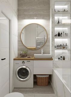 a washer and dryer in a bathroom with white tile walls, flooring and shelving