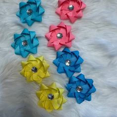 Bundle (8) Of 3" Ribbon Flower Bows Includes; Set Of 3" Turquoise Ribbon Flower Bows 7665 Set Of 3" Watermelon Ribbon Flower Bows 7429 Set Of 3" Sky Blue Ribbon Flower Bows 7428 Set Of 3" Yellow Ribbon Flower Bows 7427 4 Matching Set Of 2 - 3" Ribbon Flower Bows. Made Out Of Grosgrain Ribbon. Finished On A Single Prong Alligator Clip Perfect To Add That Extra Finishing Touch To For Any Outfit That Your Princess Deserves. Brand New, Never Worn. New From My Boutique With Tags, Allow For Slight Col Yellow Ribbon, Handcrafted Accessories, Kids Hair Accessories, Ribbon Flowers, Blue Ribbon, Grosgrain Ribbon, Blue Yellow, Kids Accessories, Color Variations