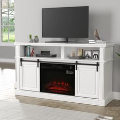 PRICES MAY VARY. 【Dimensions】The fireplace TV stand dimensions—58.1"L x 15.8"D x 32.3"H. Max capable bear 240 Ibs. Accommodates most flat screen TVs up to 65". 【23" Electric Fireplace】 Unlike the 18" electric fireplace, the 23" electric fireplace can provide more heat. It can heat a room up to 300 square feet. 【Remote Control and Timing function】The white electric fireplace tv stand come with a remote control, allowing you to easily adjust the various functions on the sofa without getting up fre White Electric Fireplace, White Tv Stand, Farmhouse Entertainment Center, Tv Console Modern, Barn Door Tv Stand, Wood Entertainment Center, Fireplace Entertainment Center, Farmhouse Cabinets, White Tv Stands