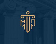 the letter m in gold on a dark blue background with pillars and columns behind it