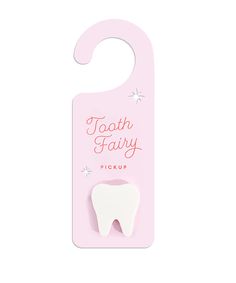 a tooth shaped pin with the words tooth fairy on it's front and back