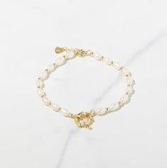 Beautiful pearl bracelet! It is super chic and trendy. Pairs nicely with other bracelets or worn on its own. Made of 925 Sterling Silver We use a THICK plating of 14k Gold or Rhodium for a piece that will be with you for years to come 6.25", 6.5" or 6.75" + .5" Ext Lobster Clasp Closure Thickness: 4mm Perfect Bracelet Stack, Earring Inspo, Pearl Bracelet Gold, Pinterest Ideas, Jewelry Accessories Ideas, Celestial Jewelry, Girl Jewelry, Accessories Ideas, Stacked Jewelry