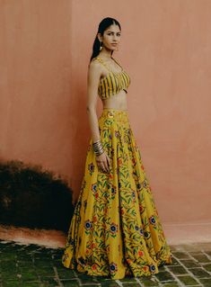 Exquisite dupion silk, lehenga with a vibrant yellow mix print and an embroidered waistband, paired with a printed, embroidered blouse and a delicate embroidered organza dupatta. Kalamkari Print, Lehenga Pattern, Printed Lehenga, Padded Blouse, Lehenga Blouse, Embroidered Organza, Dupion Silk, Silk Lehenga, Organza Dupatta