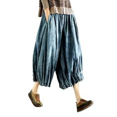 Rediscover the essence of y2k fashion with our pleated culottes denim pants from our 2023 Spring Collection! Crafted from luxe denim with a high-waisted silhouette. these vintage-inspired gaucho feature a unique folded design that adds a touch of sophisticated finesse. A zipper closure ensures comfort and effortless style. making these pants a must-have for the fashionista in you!Why This Piece Is a Wardrobe StapleStrike the perfect balance between retro and modern trend with these timeless culo Spring Wide Leg Dark Wash Cropped Jeans, Spring Pleated Wide Leg Pants, Cotton Wide Leg Cropped Jeans For Fall, Wide-leg Cotton Cropped Jeans For Fall, Baggy Cotton Retro Bottoms, Retro Baggy Wide-leg Bottoms, Retro Baggy Wide Leg Bottoms, Trendy Knee-length Bottoms With Pockets, Spring Cotton Culottes With Cropped Leg