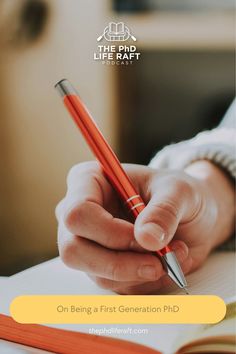 a person holding a pen and writing in a notebook with the title on being a first generation ph d