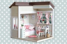 a doll house with furniture and accessories on the floor in front of a polka dot background