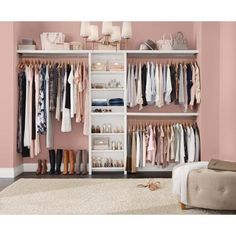 an organized closet with clothes, shoes and other items on shelves in front of a pink wall