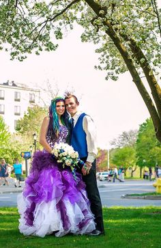 a man and woman dressed up in costume posing for a photo on their wedding day