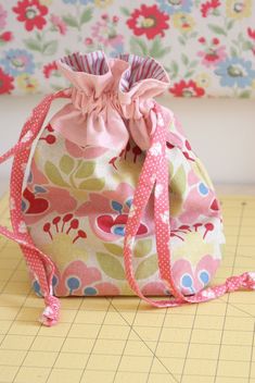 a small bag sitting on top of a table