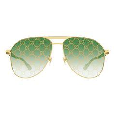 Introducing the luxurious Gucci GG1220S 004 Gold/Green with Pattern sunglasses, a must-have accessory for the modern man with an eye for high fashion. Crafted from the finest metal materials, these Aviator-style frames exude sophistication and style. The striking gold frame effortlessly complements the vibrant green lenses with a unique pattern, creating a bold and statement-making look. The oversized lens socket width of 59 and the bridge size of 14 ensure a comfortable and secure fit for all-day wear. Designed with precision and attention to detail, these Gucci sunglasses feature the iconic Gucci logo on the temples, showcasing the brand's heritage and status as a leader in luxury fashion. The temple length of 145 adds a touch of elegance to the overall design, making these sunglasses an Designer Gold Aviator Sunglasses With Uv Protection, Luxury Green Sunglasses With Uv Protection, Luxury Aviator Sunglasses With Gradient Lenses For Summer, Luxury Green Sunglasses With Mirrored Lenses, Luxury Aviator Sunglasses With Mirrored Lenses, Luxury Green Sunglasses With Gradient Lenses, Elegant Green Gucci Sunglasses, Designer Aviator Sunglasses With Mirrored Lenses, Luxury Aviator Sunglasses With Uv Protection