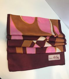 "Absolutely fabulous, mod scarf by Creation Elle Aime Paris in a pink, gold and magenta colorways. The scarf measures approximately 60\" x 14\". Signed \"Creation Elle Aime\". Tag is missing. In excellent vintage condition. FREE SHIPPING EVERYWHERE Prices are listed for Canada and USA only but if you wish to have them shipped elsewhere, please message me the shipping address and I will gladly send you a quote. We proudly reuse shipping material when we can to cut down waste to prevent our belove Gold And Magenta, Retro Silk Scarf, Vintage Pink Silk Scarves, Vintage Pink Silk Scarf, Retro Red Silk Scarf, Pink Vintage Silk Scarves, Pink Silk Vintage Scarves, Retro Scarf, Hot Pink Scarf