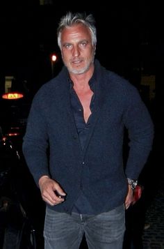 'Home at last!' David Ginola leaves hospital almost two weeks after quadruple heart bypass Silver Foxes Men, Silver Fox, Mens Style, Gentleman Style, At Last, Stylish Men, Mens Suits