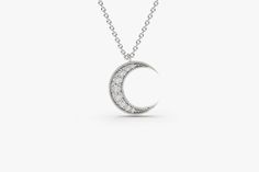 Mini Crescent Moon Diamond Necklace in 14k Gold / Double Horn Diamond Necklace / Diamond Gift for Her / Valentines Day Bracelet Ferkos Fine Jewelry Features * Made to Order. * Gold KT: 14K * Choice of Gold Color: Rose Gold, Yellow Gold, White Gold * Pendant Height: 11MM * Round Diamond: Graduates from 1.5MM to 1.2MM * Number of Diamonds: 9 * Total CTW: 0.12ctw * Diamond Color-Clarity: G Color Si Clarity * Setting Type: Micro-Pave * Ready to Ship in 7-10 Business Days ▶ Want to find out more? Che Diamond Moon Necklace, Gold Moon Necklace, Crescent Necklace, Crescent Moon Pendant, White Gold Pendant, Diamond Gift, Crescent Moon Necklace, Gold Moon, Moon Pendant