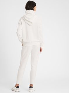 French Terry Face-Shield Hoodie | Banana Republic Casual Hoodie With Soft Texture And Relaxed Fit, Comfy Relaxed Fit Hoodie With Soft Texture, Casual Soft Texture Relaxed Fit Hoodie, Relaxed Fit Hoodie For Loungewear With Soft Texture, Casual Cotton Hoodie With Soft Texture, Soft Relaxed Fit Hoodie For Loungewear, Casual Hoodie In Winter White With Ribbed Cuffs, Soft Textured Relaxed Fit Hoodie For Loungewear, Sporty Winter White Hoodie With Drawstring